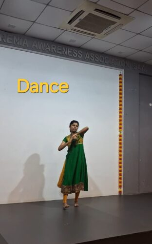 Dance – A participant performing a traditional dance on stage during the Mental Health Week Talent Show on 6th October 2026. Participant performing a traditional dance on stage during the Mental Health Week Talent Show at SAA