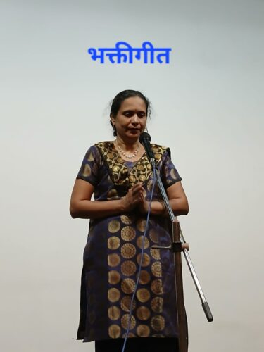 भक्तीगीत (Devotional Song) – A participant singing a devotional song during the Mental Health Week Talent Show on 6th October 2026. Participant performing a devotional song (Bhaktigeet) during the Mental Health Week Talent Show at SAA