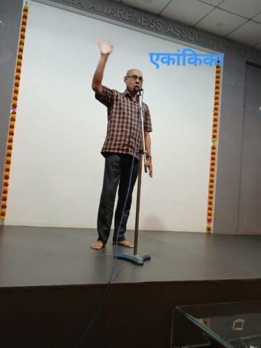 एकांकिका (One-Act Play) – A participant performing a one-act play during the Mental Health Week Talent Show on 6th October 2026. Participant performing a one-act play (Ekankika) on stage at SAA during the Mental Health Week Talent Show
