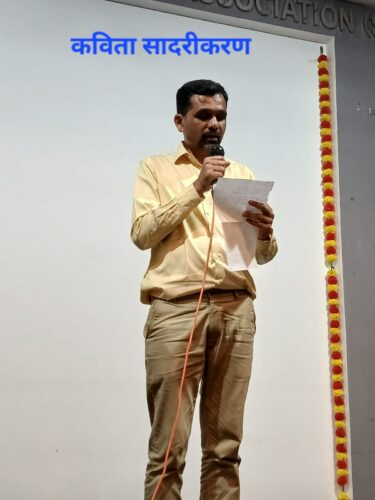 कविता सादरीकरण (Poetry Recitation) – A participant reciting poetry on stage during the Mental Health Week Talent Show on 6th October 2026. Participant reciting poetry on stage during the Mental Health Week Talent Show at SAA
